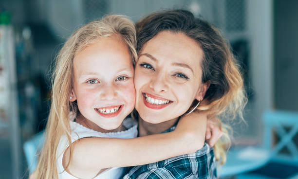 istock Mother and daughter love 1180563263