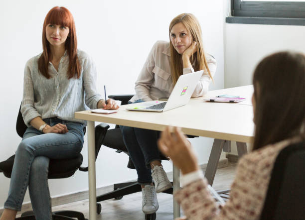 istock New business team: at work together in the startup office 1180565918