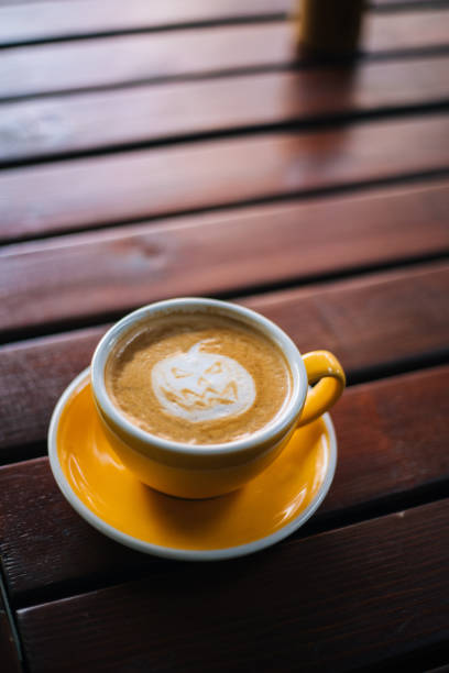 istock Halloween Pumpkin Cappuccino coffee art 1180568963