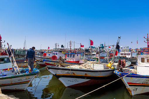 Tunisia. (South Tunisia) Djerba island. Houmt Souk. June 21, 2014. Typical fisher boats at the fishing port