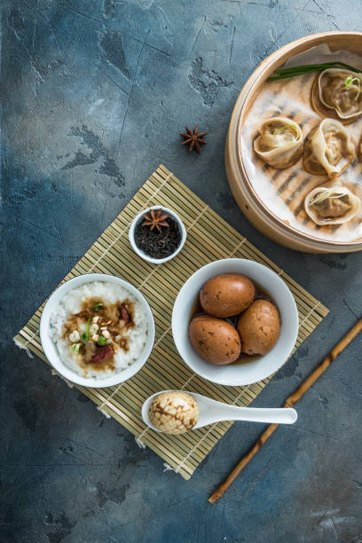 istock Chinese Streamed Dumpling with tea eggs and porrige 1180573226