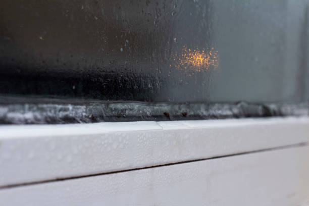 istock the problem of freezing of plastic Windows in the winter time, the front and background blurred with the bokeh effect 1180573246