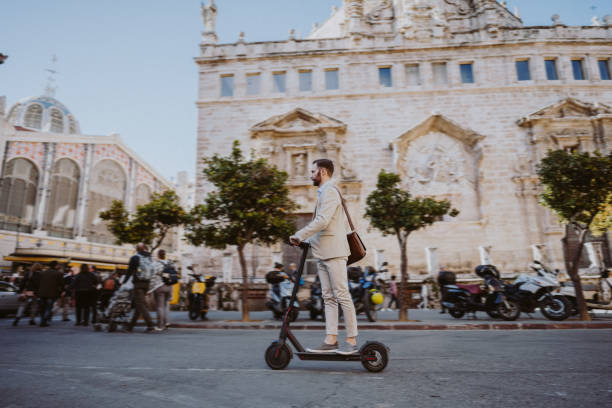 istock Businessman riding a motor scooter in Valencia 1180574600