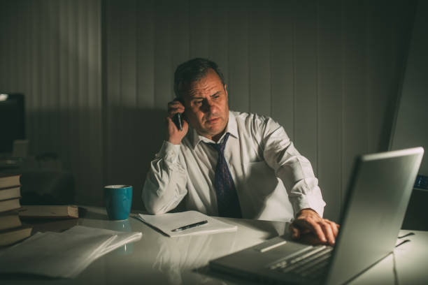 istock An older businessman works in his office late 1180575335