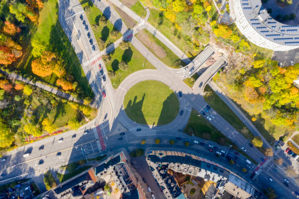 istock Green traffic circle seen from above 1180576493