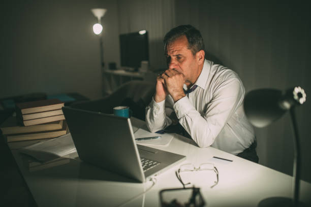 istock An older businessman works in his office late 1180576650