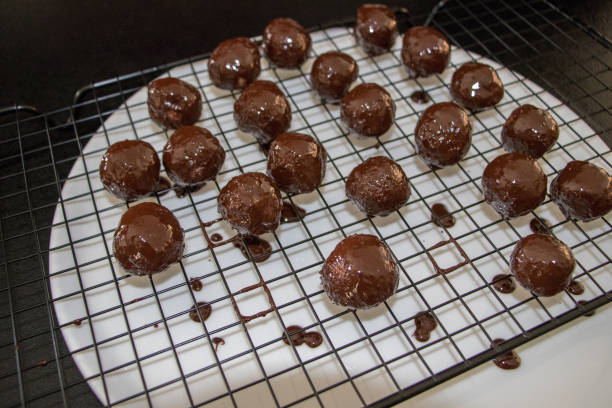 istock a few chocolate balls above plate close up 1180579443