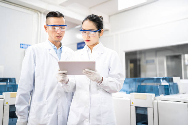 istock Asian scientists using a digital tablet in a medical laboratory 1180581895