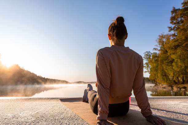 istock Outdoor morning yoga 1180591268