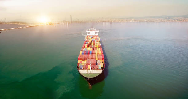 istock Aerial view of cargo ship in transit. 1180592419