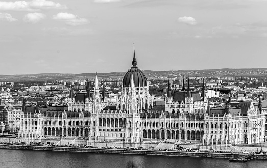 Budapest, Hungary - July 14, 2019: Hungarian Parliament building in the city of Budapest. A sample of neo-gothic architecture, Budapest's tourist attraction