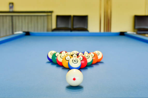 istock Billiard balls on the blue cloth table 1180595196