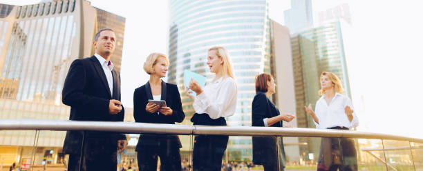 istock Biz team members shaking hands in La Defense Paris 1180600512