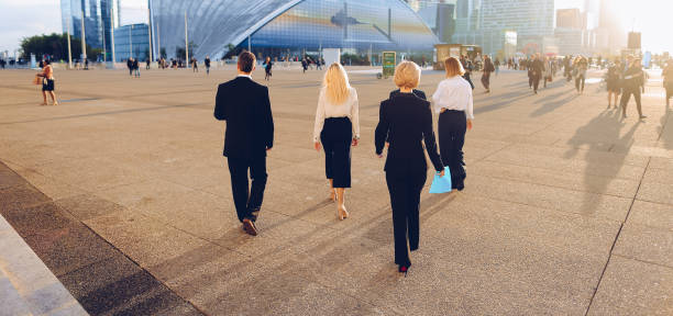 istock Business persons walking outside in 1180600558