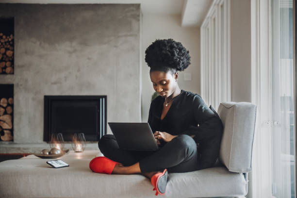istock African woman at home 1180600609