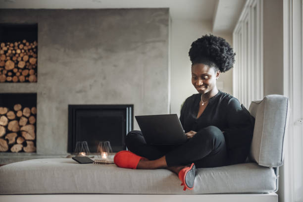 istock African woman at home 1180600706