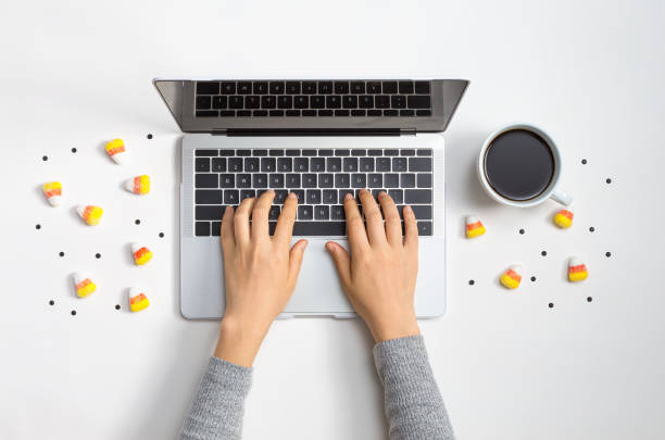 istock Halloween candies with laptop 1180601366