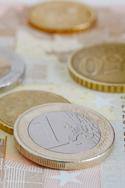 istock Euro coins on top of a bank note 118060179