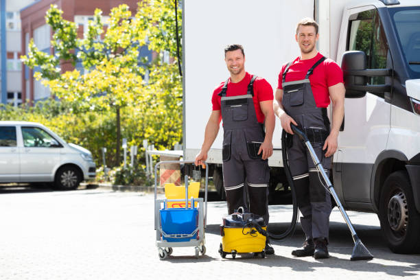 istock Male Janitors With Cleaning Equipment 1180605705