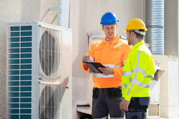 istock An Electrician Men Checking Air Conditioning Unit 1180606713