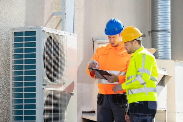 istock An Electrician Men Checking Air Conditioning Unit 1180606716