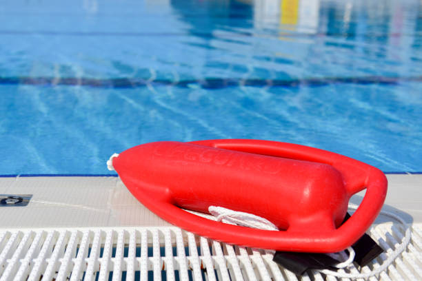 istock Life guard rescue buoy at the pool 1180608428