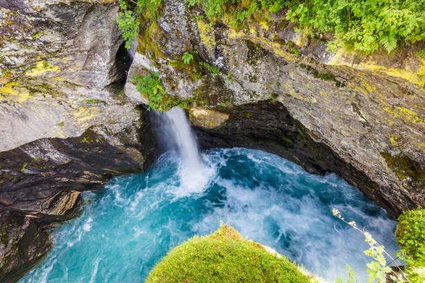 Pothole with waterfall at ravine Gudbrandsjuvet along national scenic route Geiranger Trollstigen road 63 in More og Romsdal county in Norway