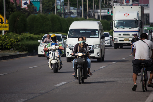 Chiangmai, Thailand -  October 10 2019: Private Motorcycle, Honda Honda On highway road. Road to chiangmai city.