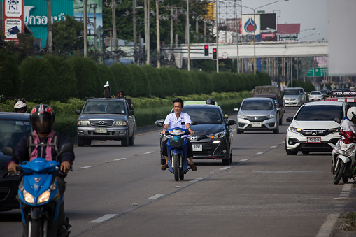 Chiangmai, Thailand -  October 10 2019: Private Motorcycle, Honda Honda On highway road. Road to chiangmai city.