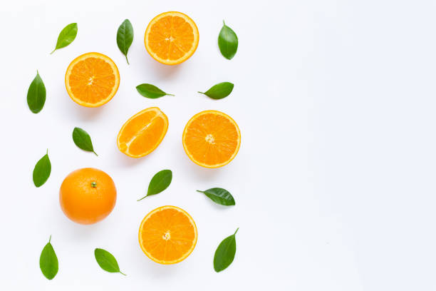 istock Fresh orange citrus fruit with leaves isolated on white background. 1180611683
