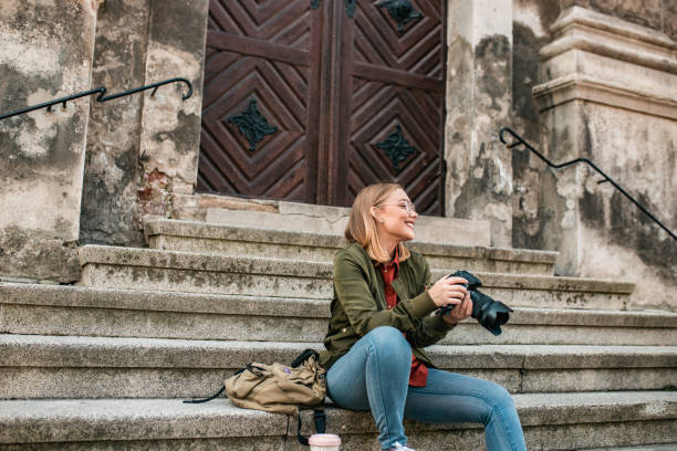 istock Young woman on a tour 1180612711