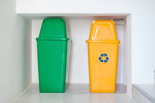 istock Colorful recycle bins on the floor 1180613986