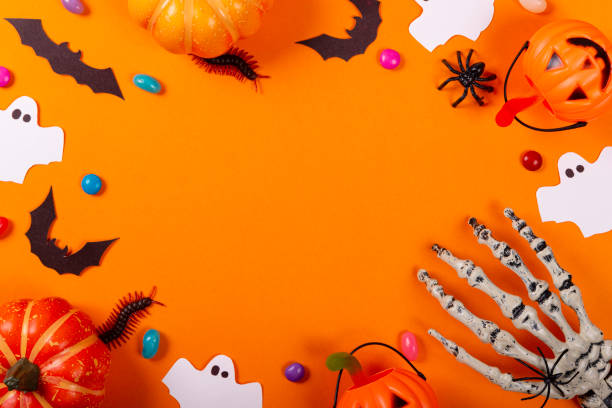 istock Halloween and decoration concept. Collection of Halloween party objects forming a frame 1180614985