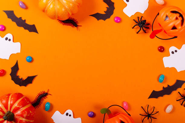 istock Halloween and decoration concept. Collection of Halloween party objects forming a frame 1180615019