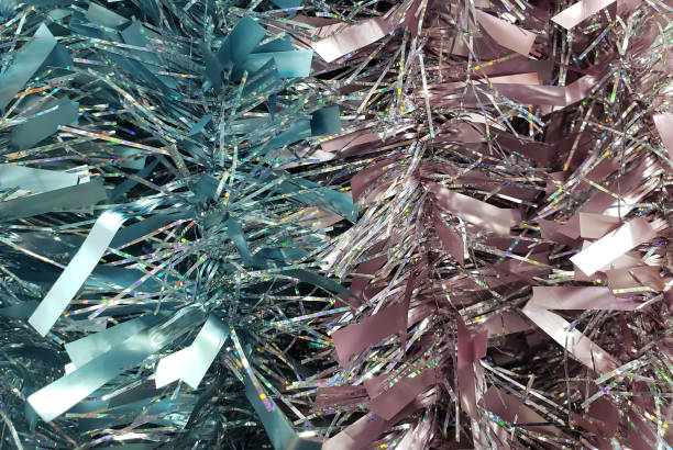 istock Colorful blue and pink tinsel Christmas blurred background 1180617772