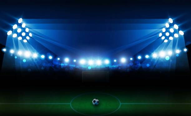 istock Football arena field with bright stadium lights vector design. 1180618600