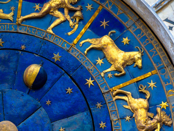 Capricorn astrological sign on ancient clock. Detail of Zodiac wheel with Moon and constellations. Capricorn astrological sign on ancient clock, medieval Torre dell’Orologio in Venice. Detail of Zodiac wheel with Moon and constellations. Golden symbol of Capricorn on star circle closeup. Concept of astrology and horoscope. capricorn photos stock pictures, royalty-free photos & images