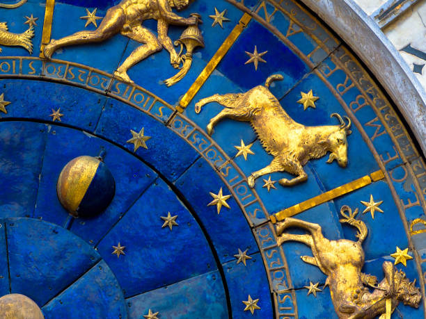 Capricorn astrological sign on ancient clock. Detail of Zodiac wheel with Moon and constellations. Capricorn astrological sign on ancient clock, medieval Torre dell’Orologio in Venice. Detail of Zodiac wheel with Moon and constellations. Golden symbol of Capricorn on star circle closeup. Concept of astrology and horoscope. capricorn zodiac stock pictures, royalty-free photos & images