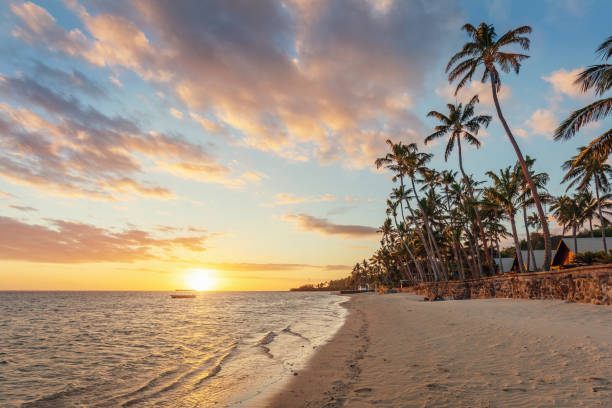 Fiji Island Viti Levu Colorful Beach Sunset Beautiful sunset over the pacific ocean at scenic natural beach Viti Levu, Fiji. Korotogo Coast, South Coast, Western Division, Fiji, Oceania suva photos stock pictures, royalty-free photos & images