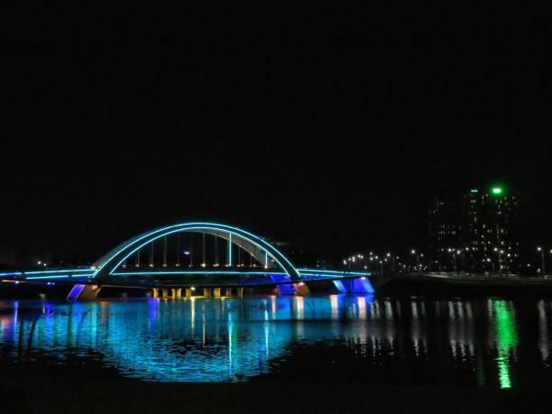 istock Night view of a luminous bridge. 1180627542