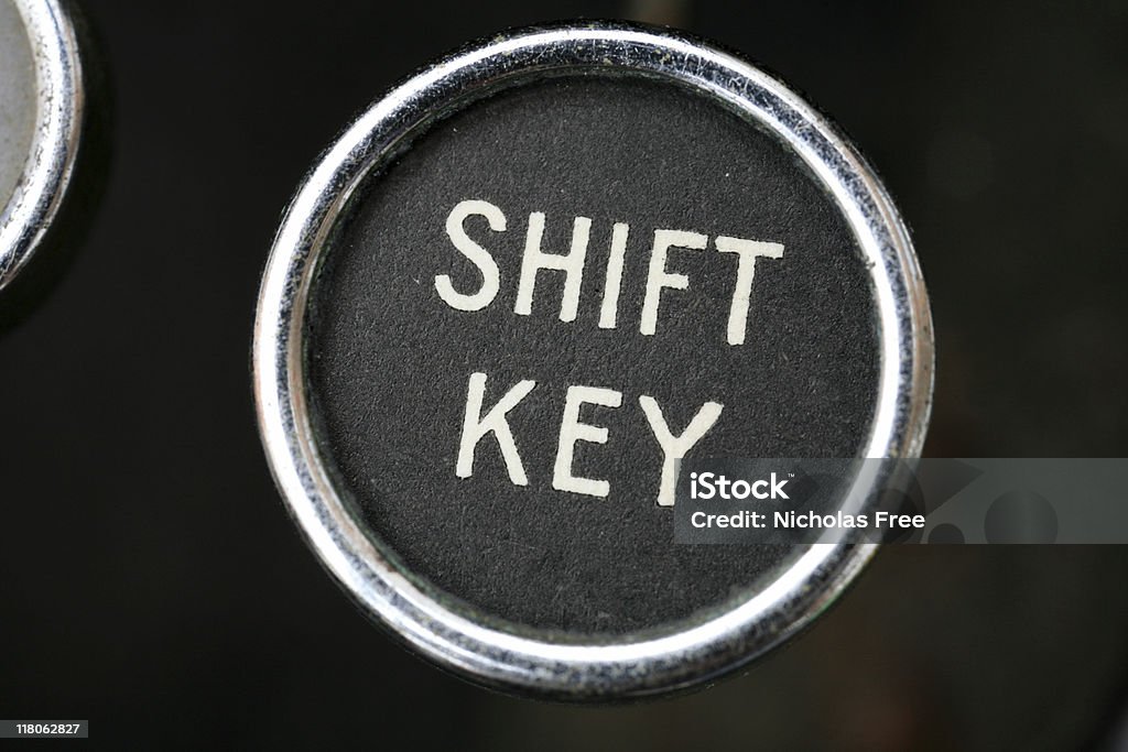 Shift Key Shift Key on Vintage Type Writer. shallow depth of field. Change Stock Photo