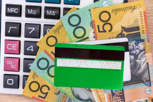 istock Credit card on australian dollar close up 1180634465