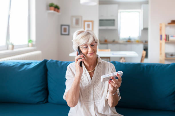 istock Senior woman using healthcare technology about medication 1180634979