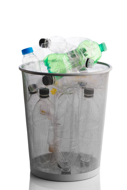 istock trash can with wasted plastic bottles, isolated on white 1180636064