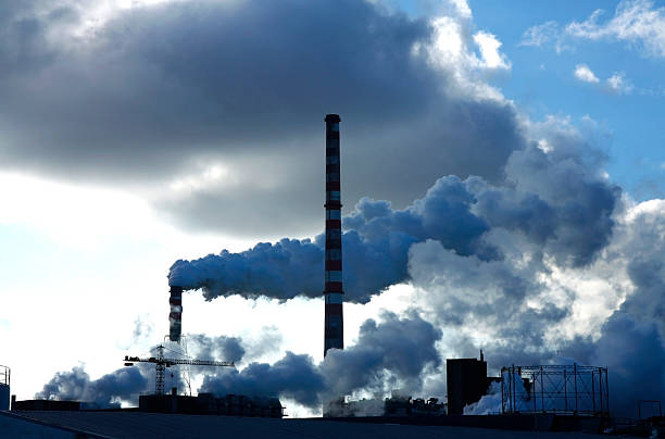 istock smoked factory under tropical sky 118063652