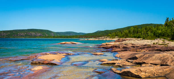 istock Red Volcanic Rock on Lake Superior 1180638146