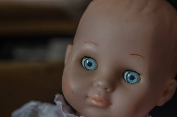 istock Doll looks in detail 1180641758