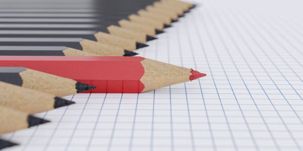 istock One red pencil and other black pencils in a row. 3D rendered illustration. 1180642905