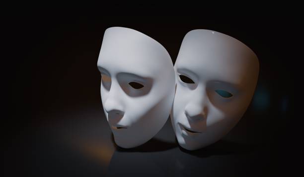 istock White theater masks on black background. 3D rendered illustration. 1180643136