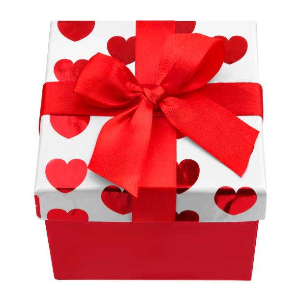 istock Gift box white and red color isolated on white background. Holiday gift box closeup with red ribbon and bow 1180645276